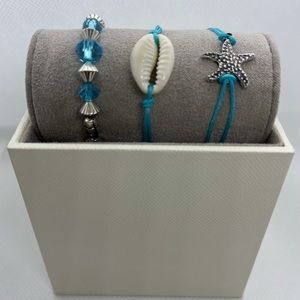 Ankle bracelet set. New.